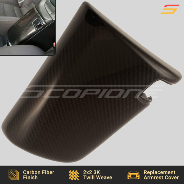 Angled view of the Scopione Carbon Fiber Console Armrest Cover for Toyota Supra MK4 (JZA80, 1993-1998) RHD, showcasing its precision-molded fitment and high-gloss carbon fiber weave.